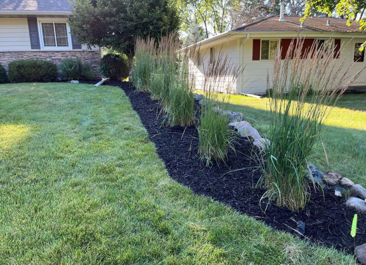 Fresh Mulch, Natural Edging, and New Plants Done Right